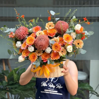 Giỏ hoa chúc mừng tone cam HG40