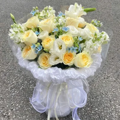 Pastel yellow blue rose bouquet HB239